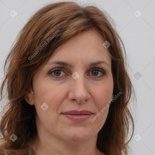 Joyful white adult female with long  brown hair and brown eyes