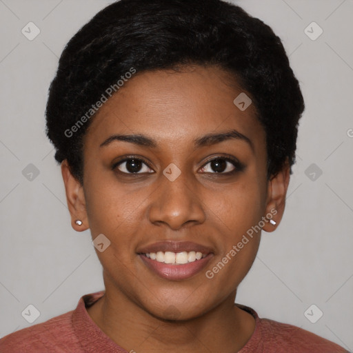 Joyful black young-adult female with short  black hair and brown eyes