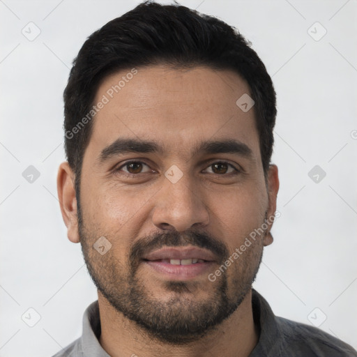 Joyful white young-adult male with short  black hair and brown eyes