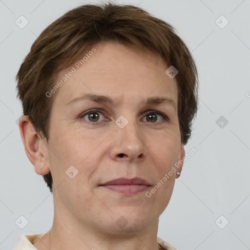 Joyful white adult female with short  brown hair and grey eyes