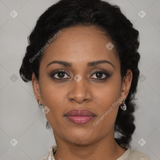 Joyful latino adult female with medium  brown hair and brown eyes