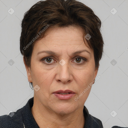 Joyful white adult female with short  brown hair and brown eyes