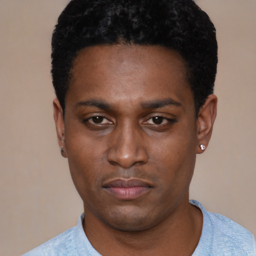 Neutral black young-adult male with short  black hair and brown eyes