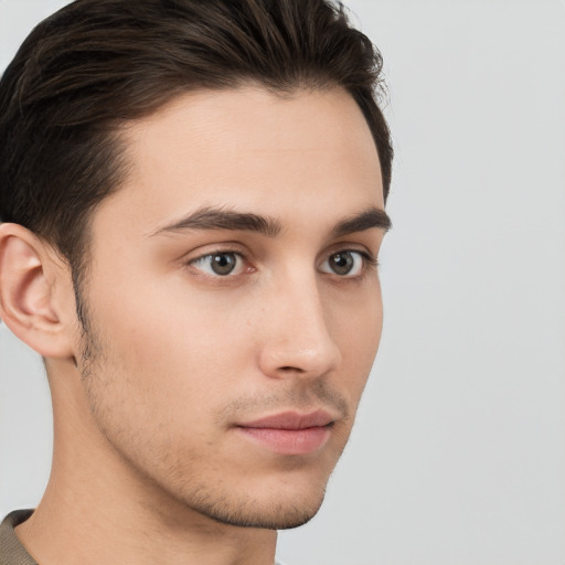 Neutral white young-adult male with short  brown hair and brown eyes