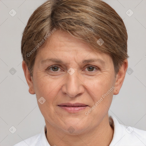 Joyful white adult female with short  brown hair and brown eyes