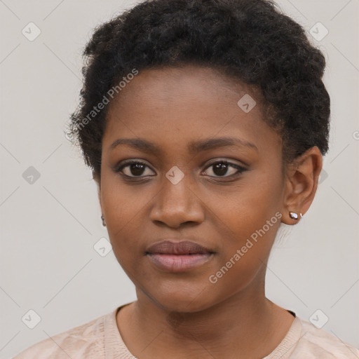 Neutral black young-adult female with short  brown hair and brown eyes