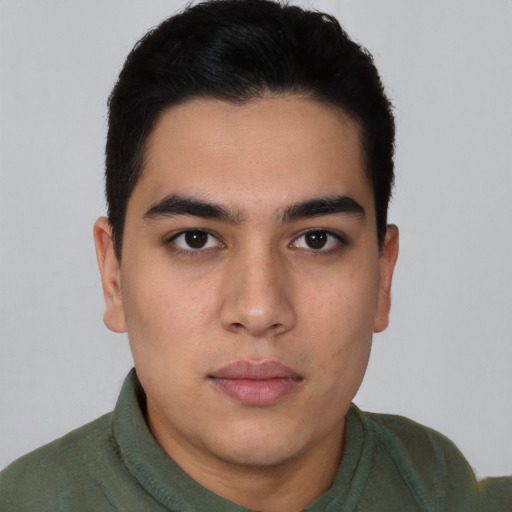 Neutral latino young-adult male with short  black hair and brown eyes