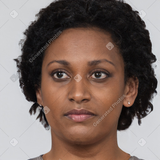 Neutral black young-adult female with short  brown hair and brown eyes