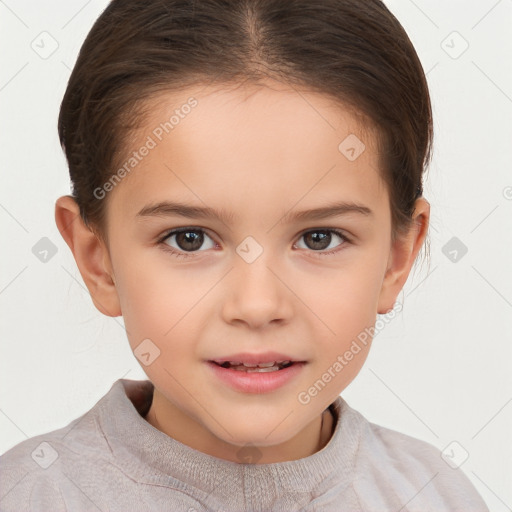 Joyful white child female with short  brown hair and brown eyes