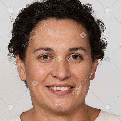 Joyful white adult female with short  brown hair and brown eyes