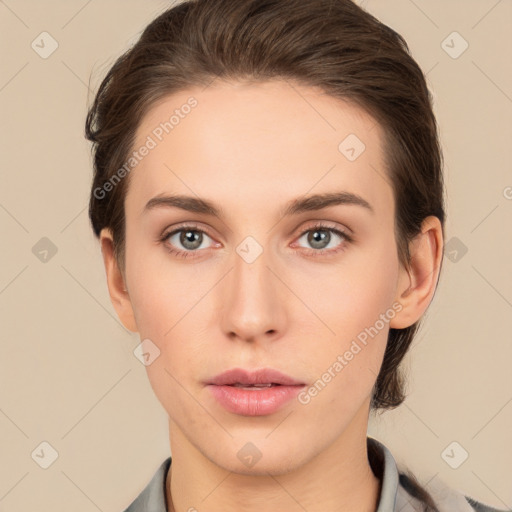 Neutral white young-adult female with short  brown hair and brown eyes