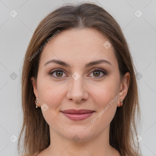 Joyful white young-adult female with long  brown hair and grey eyes