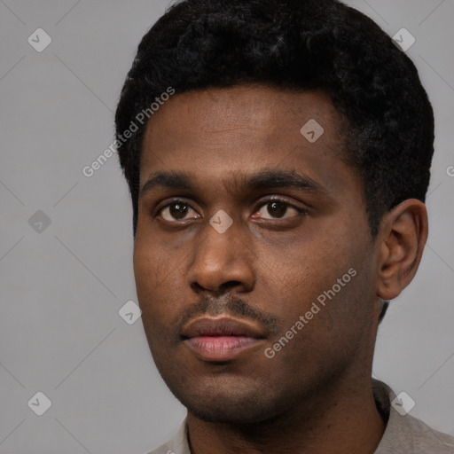Neutral black young-adult male with short  black hair and brown eyes