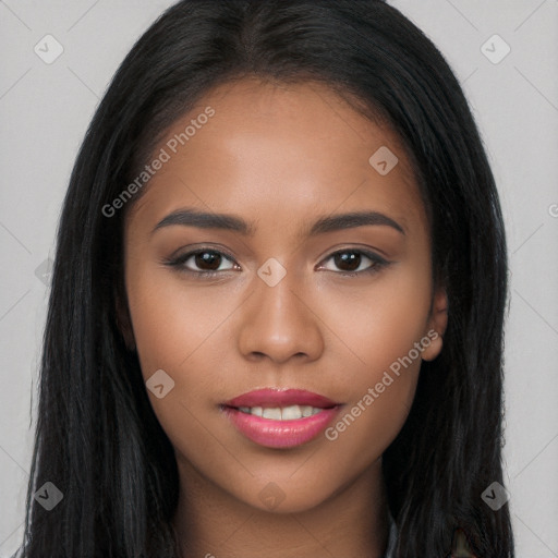 Joyful latino young-adult female with long  brown hair and brown eyes