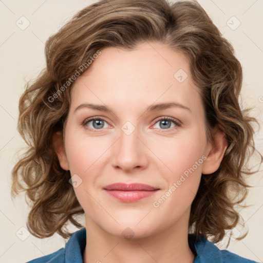 Joyful white young-adult female with medium  brown hair and blue eyes