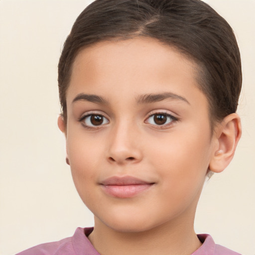 Joyful white child female with short  brown hair and brown eyes