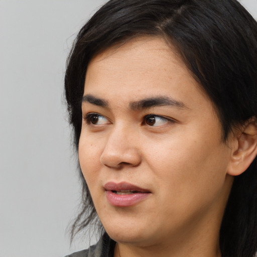 Neutral asian young-adult female with long  black hair and brown eyes