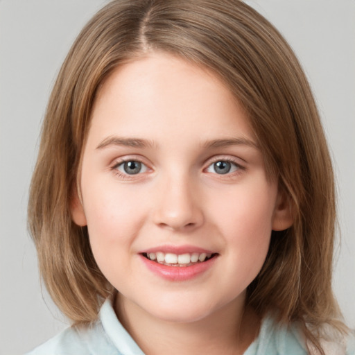 Joyful white child female with medium  brown hair and grey eyes