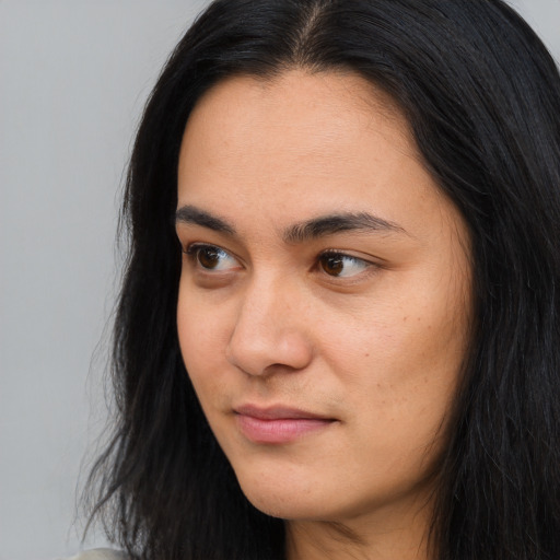 Neutral asian young-adult female with long  brown hair and brown eyes