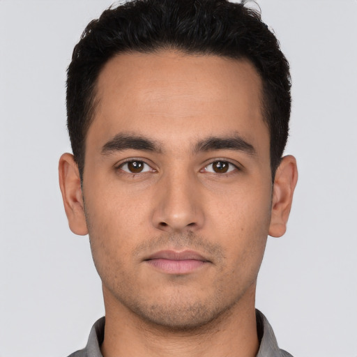 Neutral white young-adult male with short  black hair and brown eyes