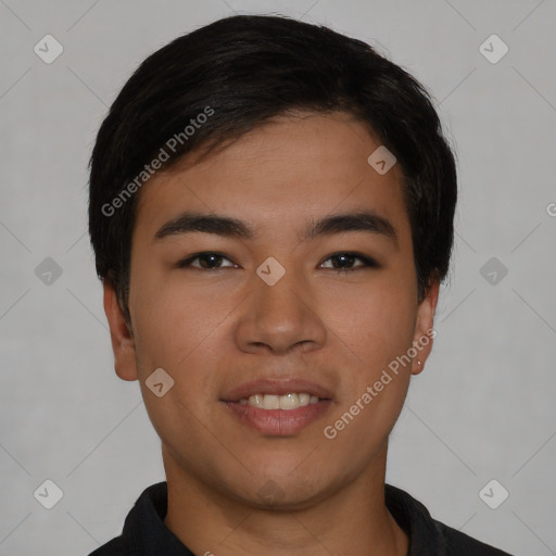 Joyful asian young-adult male with short  black hair and brown eyes