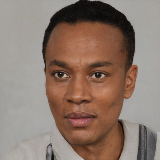 Neutral latino adult male with short  black hair and brown eyes