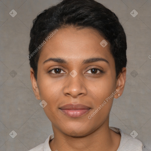 Joyful black young-adult female with short  black hair and brown eyes