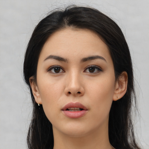 Neutral asian young-adult female with long  black hair and brown eyes