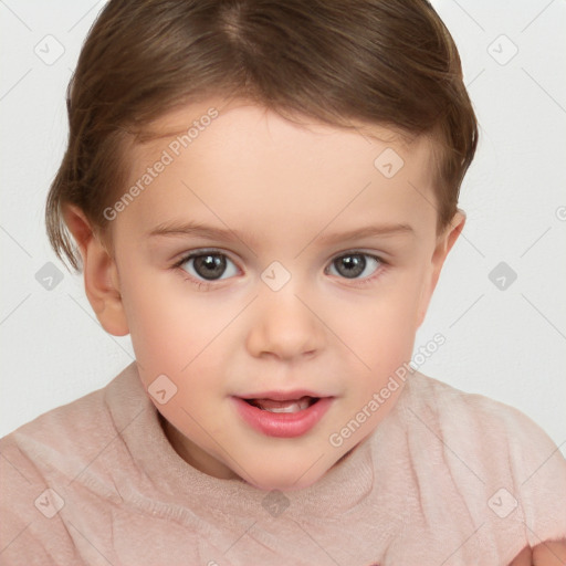 Joyful white child female with short  brown hair and brown eyes