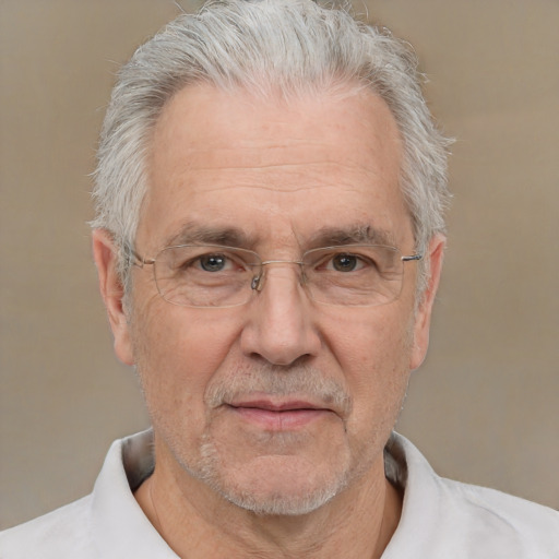 Neutral white middle-aged male with short  gray hair and brown eyes