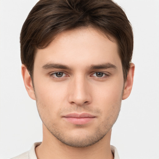 Neutral white young-adult male with short  brown hair and brown eyes