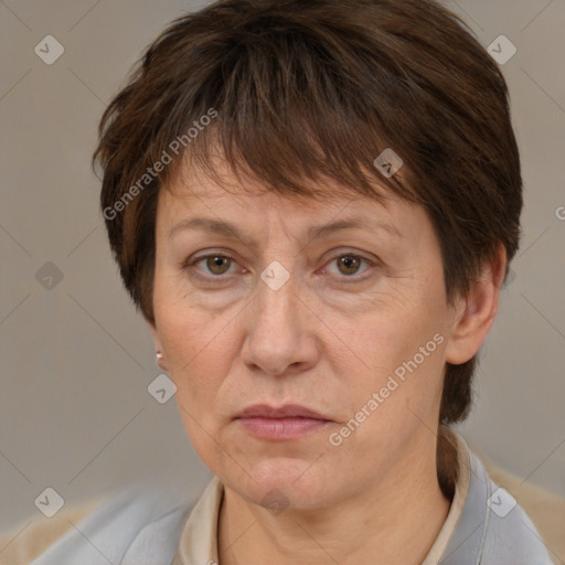 Joyful white adult female with short  brown hair and brown eyes