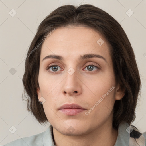 Neutral white young-adult female with medium  brown hair and brown eyes