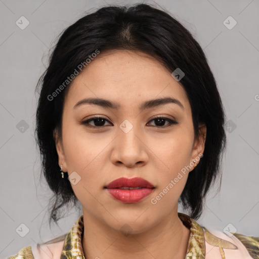 Joyful asian young-adult female with medium  black hair and brown eyes