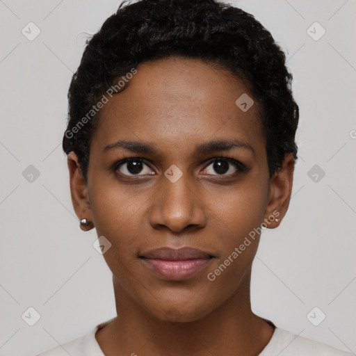 Joyful black young-adult female with short  black hair and brown eyes