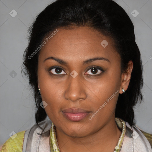 Joyful latino young-adult female with medium  brown hair and brown eyes