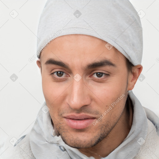 Joyful white young-adult male with short  black hair and brown eyes