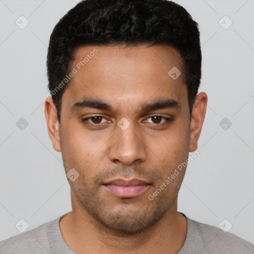 Neutral latino young-adult male with short  black hair and brown eyes