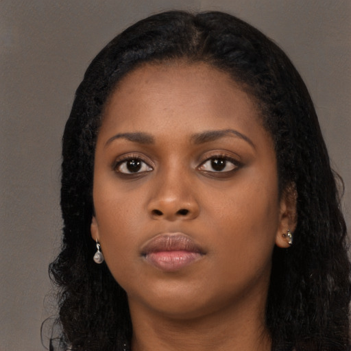 Neutral black young-adult female with long  black hair and brown eyes