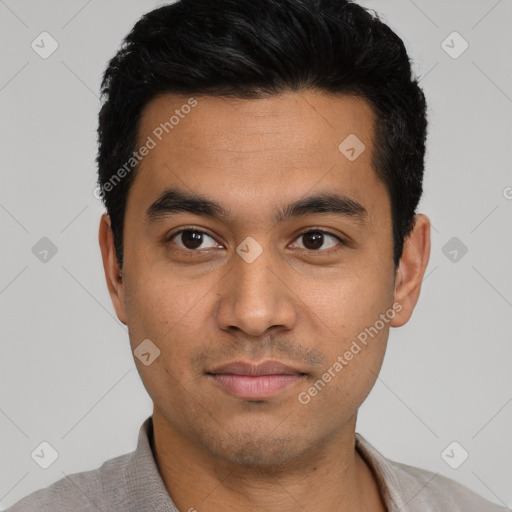 Neutral latino young-adult male with short  black hair and brown eyes