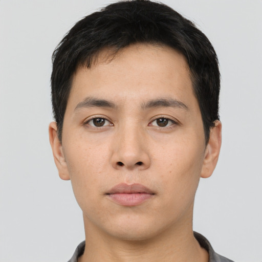 Neutral asian young-adult male with short  brown hair and brown eyes