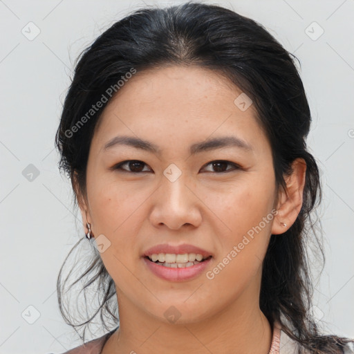 Joyful asian young-adult female with medium  brown hair and brown eyes