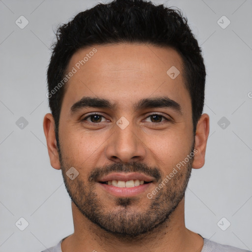 Joyful white young-adult male with short  black hair and brown eyes