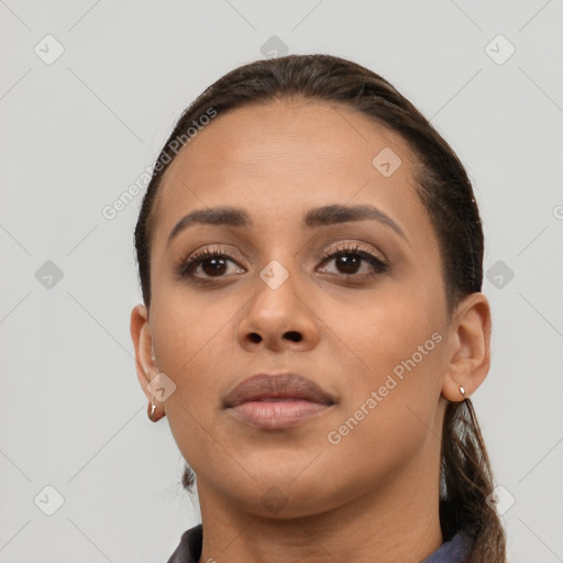 Neutral white young-adult female with long  brown hair and brown eyes