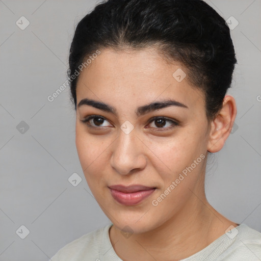 Joyful white young-adult female with short  brown hair and brown eyes