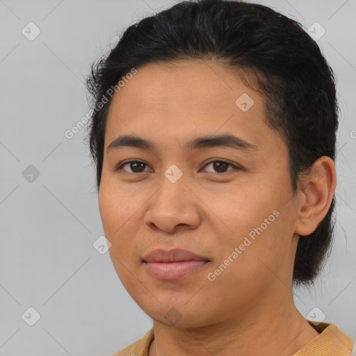 Joyful asian young-adult female with medium  brown hair and brown eyes