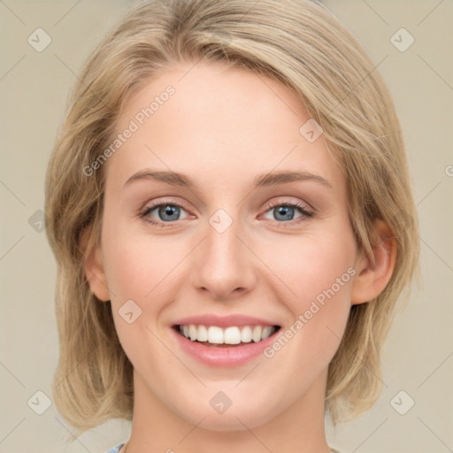 Joyful white young-adult female with medium  brown hair and green eyes