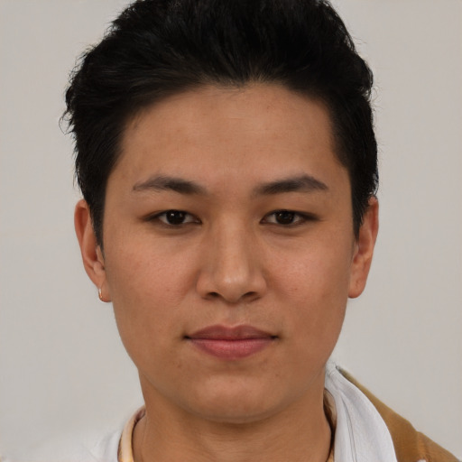 Joyful asian young-adult female with short  black hair and brown eyes