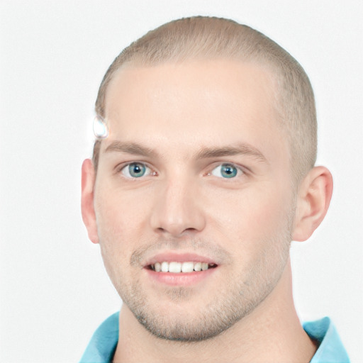 Joyful white young-adult male with short  brown hair and blue eyes