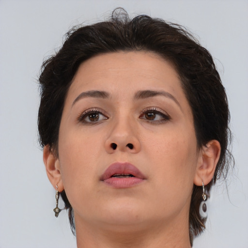 Neutral asian young-adult female with medium  brown hair and brown eyes
